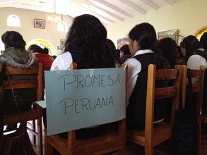 Peruvian Promise scholars listen to a speaker