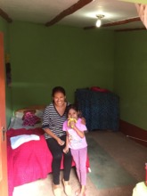 Epi proudly poses in her newly painted bedroom!