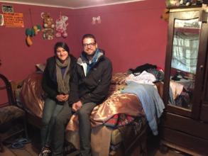 PH Scholar, Yeshira, with a PH visitor in her home