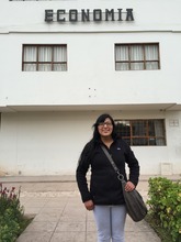 Jessica next to the UNSAAC economics building