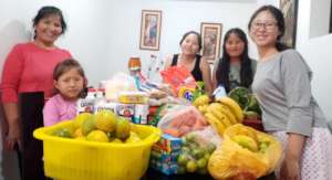 PH Scholar, Nikole, her family & their purchases.