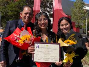 PH scholar, Norka, with her parents and degree.