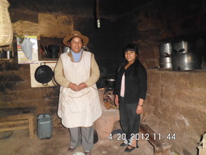 Claudia and her mother in their home.