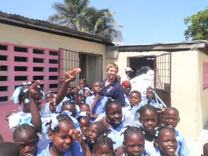 Children are happy after they receive their books