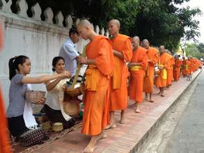 Learning about Laos Buddism Culture of Alms Giving