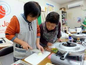 Participants carefully cut vegetables
