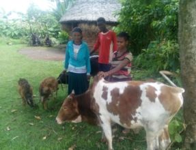 Bekelech and her older children with their animals