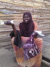 Fadumo holding some of her  hygiene items