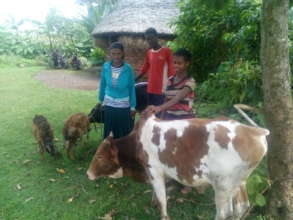 Bekelech and her older children with their animals