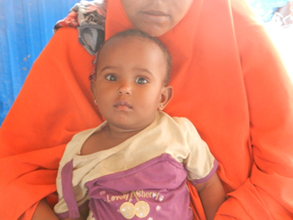 Ikhlaas with her mother