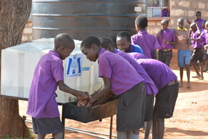 Children using our hand washing station