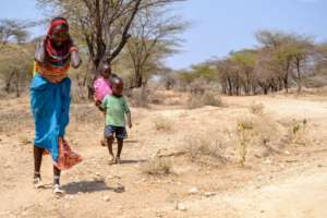 A mother and her family in search of water