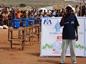 Mohammed teaches community members at Kobe Camp.