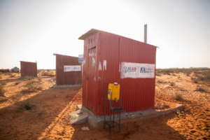 Three pit latrines at a Harhar village IDP camp