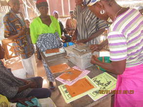 A women locks her half of the cash box