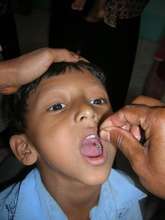 Child receiving Vitamin A Supplement
