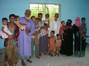 Parents in the waiting area for Vitamin A campaign