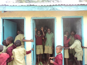 Children celebrate the new latrines. GHARP/KRA
