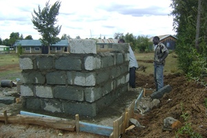 Construction of latrine walls, Matuiku. GHARP/KRA