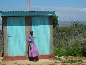 Girl Outside VIP Latrines