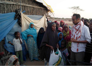 Abdisalaan with Somali refugees Liboi, Kenya