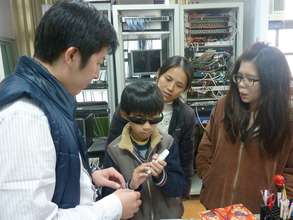 visually impaired student using DAISY player