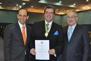 Dr. Paulo Novaes receiving Medal of Honor