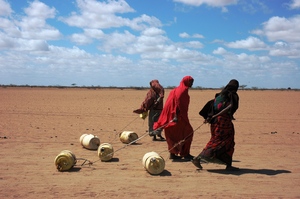 Women taking water home in Kenya