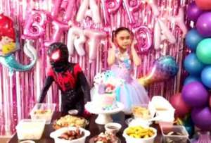 Super Brielle and brother Spider Boy celebrate