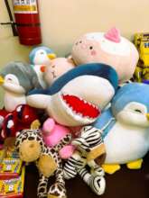 The stuffed animals are ready for a child to love