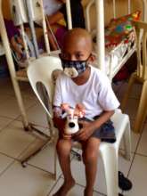 A child with his stuffed animal friend