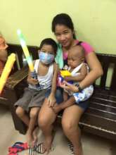 Children and their mom at the House of Hope