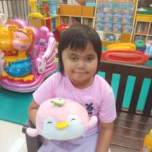 Patient with healing toy at House of Hope