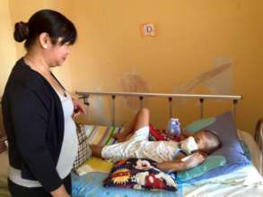 volunteer visiting child patients, House of Hope