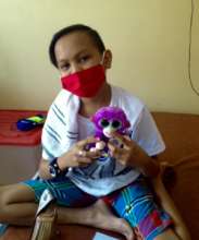 Happiness is a purple stuffed monkey