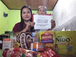 Mom and child are happy to receive care package!