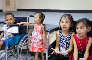 children singing  with joy after treatment