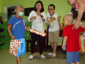 Children at House of Hope share Christmas gifts