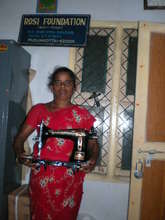 Ms.Sarathambal receives sewing machine