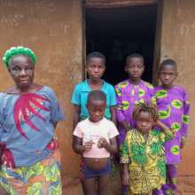 Antoine with his grandmother and siblings