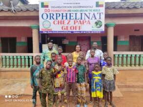 Christian with children and staff at CPG.