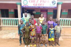 Christian with children and staff at CPG in July.