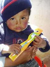Child in Jujuy receiving his tooth brush
