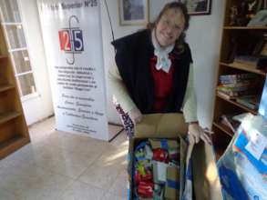 Dr. Sonia receiving donation in Santa Fe