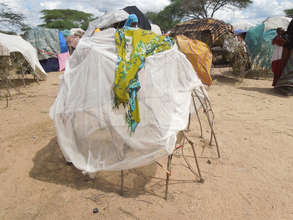 A displaced family's shelter in Dhobley.