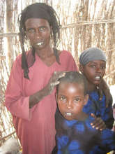 Marium Dahir and two of her children.