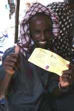 A happy recipient of a food voucher.