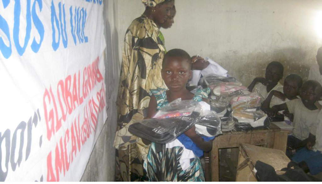 A girl receives items in Kiliba
