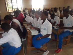 Claudine applies herself in class during an exam.