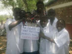 Sign: My pride is my studies, paid by GlobalGiving